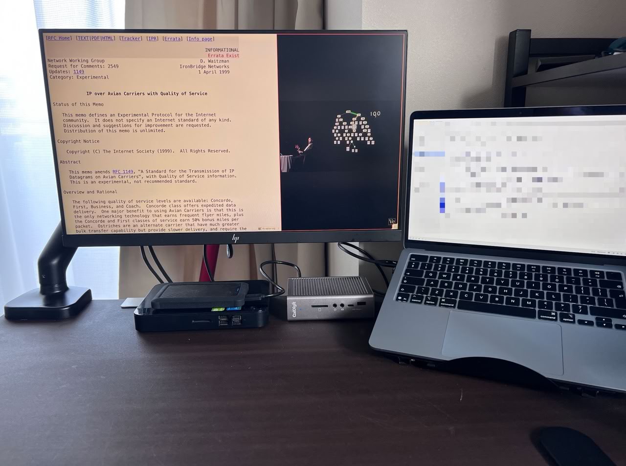 My two monitor setup with Brave in split mode on main screen